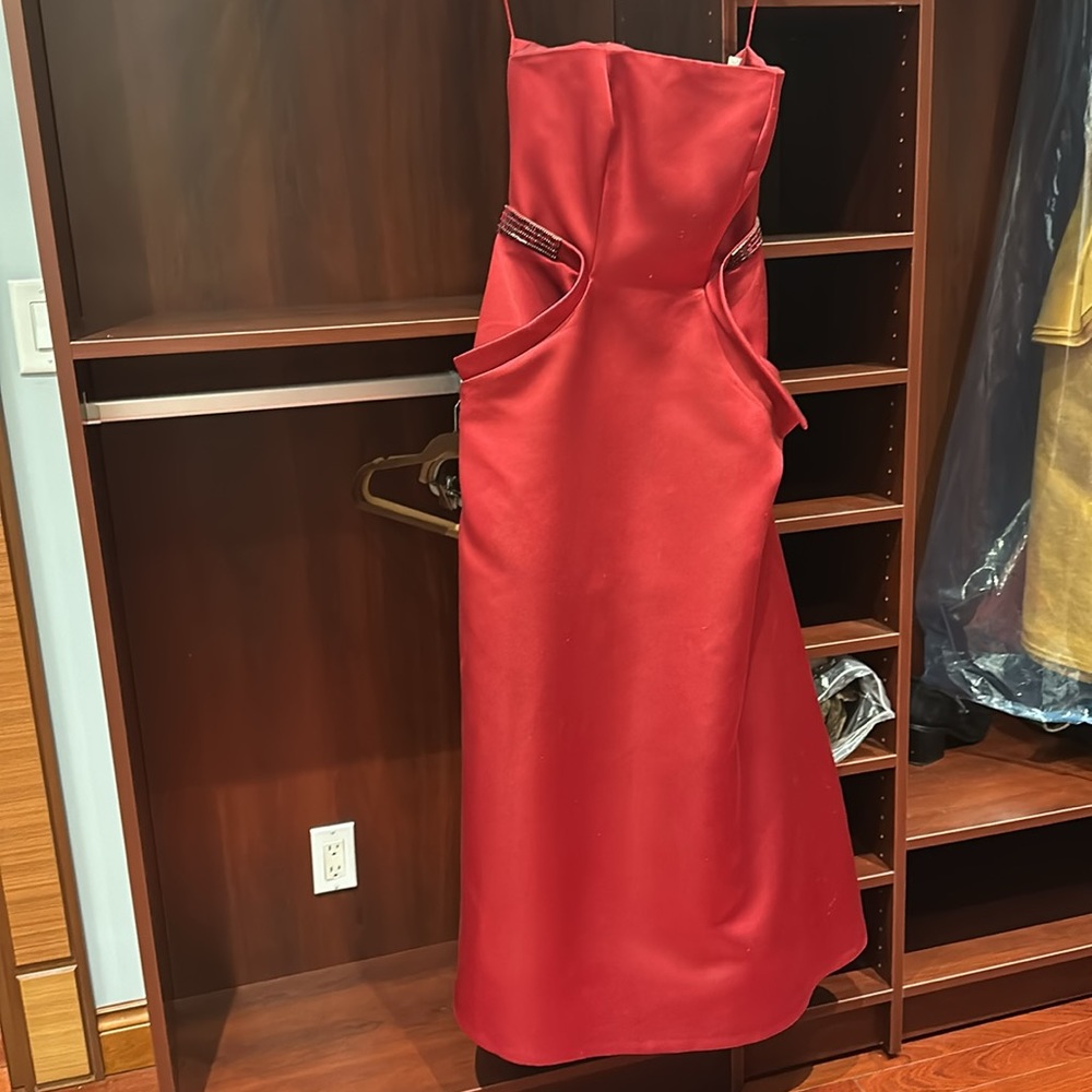 Angel Sanchez,  red strapless long dress , with extra shall to cover optional